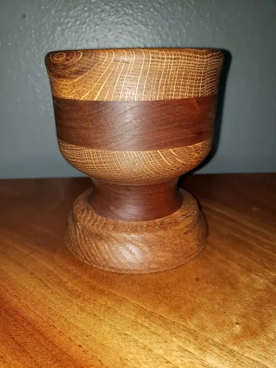 Turned wooden goblet with light and dark bands