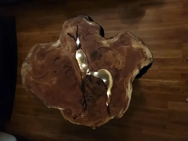 Wood slab with a light-colored fill in a crack