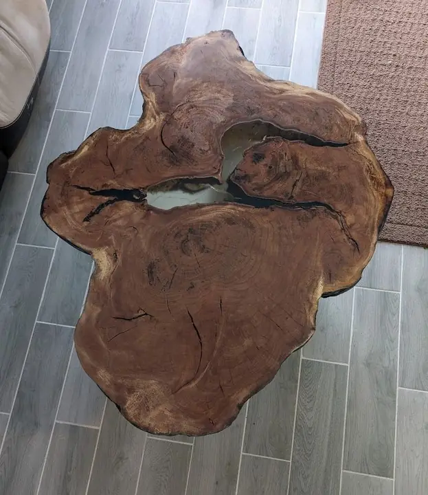 Live-edge wood slab with a light fill in the cracks