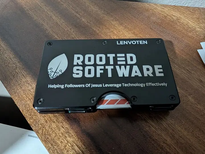 Black card engraved Rooted Software