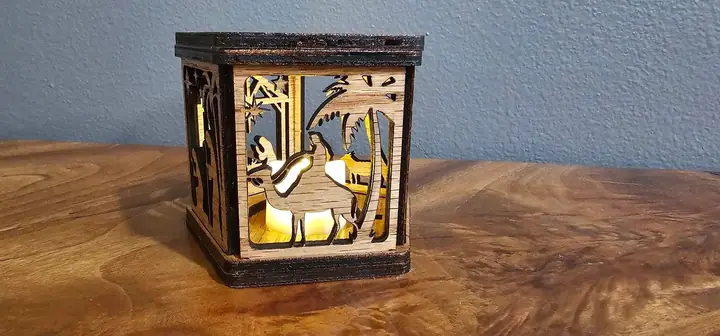 Small wooden lantern lit from inside